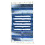 Handwoven blue and white stripe cotton area rug with fringes, perfect for adding a boho touch to dining rooms and bedrooms. This dining table rug features a classic stripe pattern, ideal for those seeking stylish cotton rugs for their home decor.