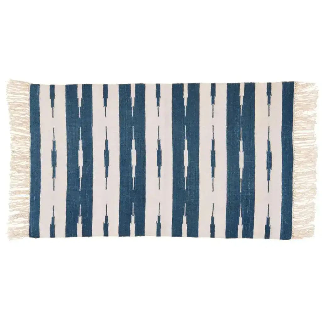 A handwoven blue and white stripe ikat cotton area rug with fringes, ideal for office or living room decor. The boho rug features a classic design, perfect as an 8x10 living room rug or for adding a touch of style to an office space.