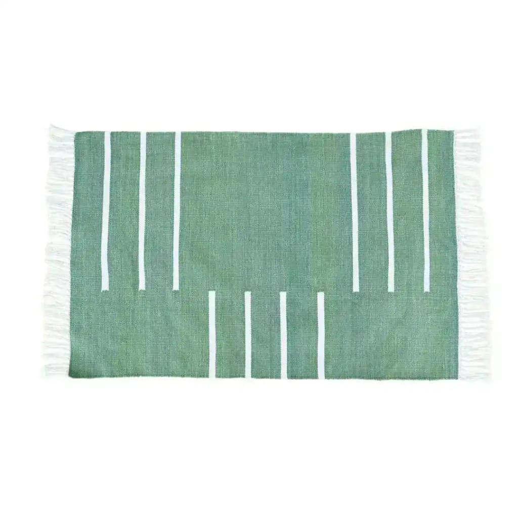 Handwoven green and white minimalistic cotton area rug with fringes, perfect for the office or as a stylish addition to your living room. This boho rug features a simple design with vertical white stripes on a green background, ideal for large living room spaces.