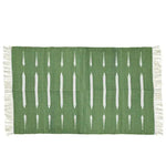 Handwoven green and white stripe cotton area rug with fringes, perfect for adding a boho touch to your dining room or office. This elegant rug is ideal for formal dining room settings, emphasizing its stylish cotton design.