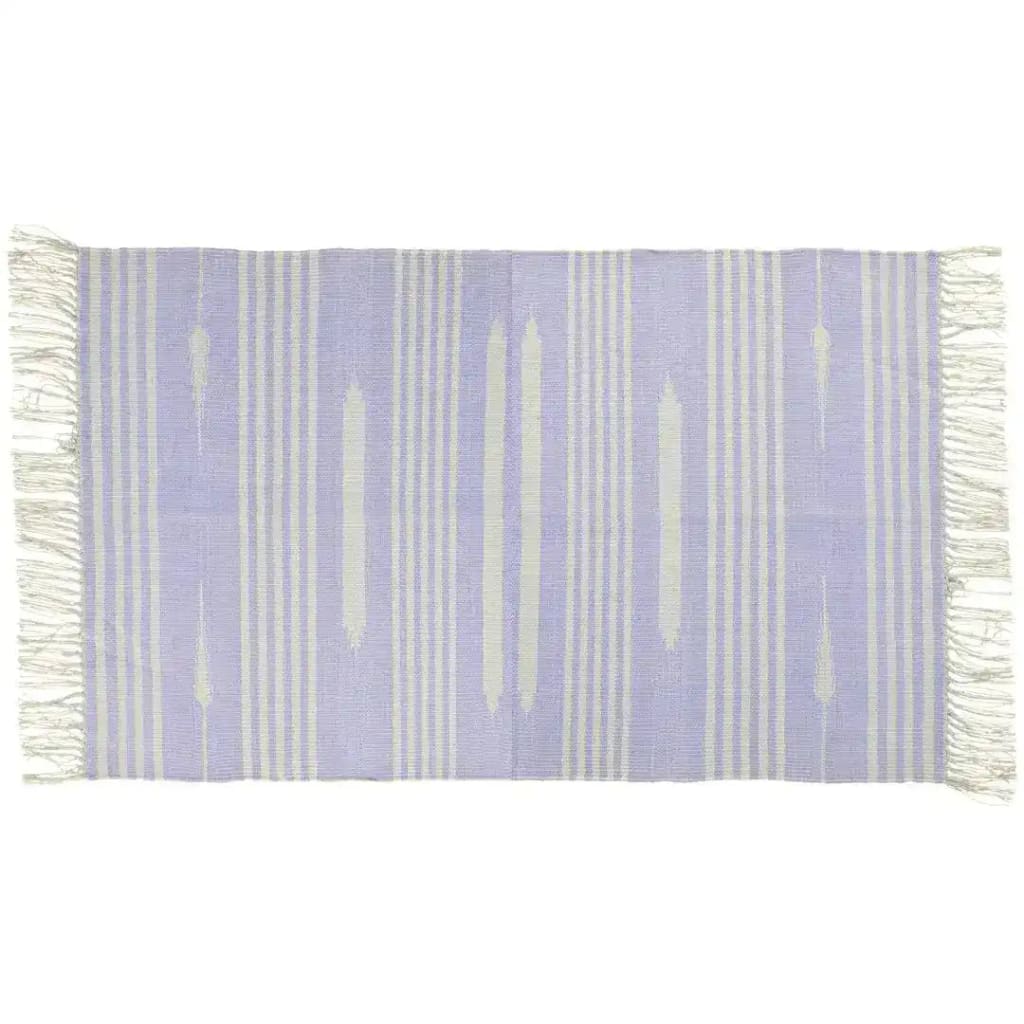 Handwoven lilac and white mini stripe cotton area rug with fringes, perfect for large living room spaces or offices. This boho rug adds a touch of elegance and comfort, ideal for those seeking cotton rugs for a stylish and cozy atmosphere.