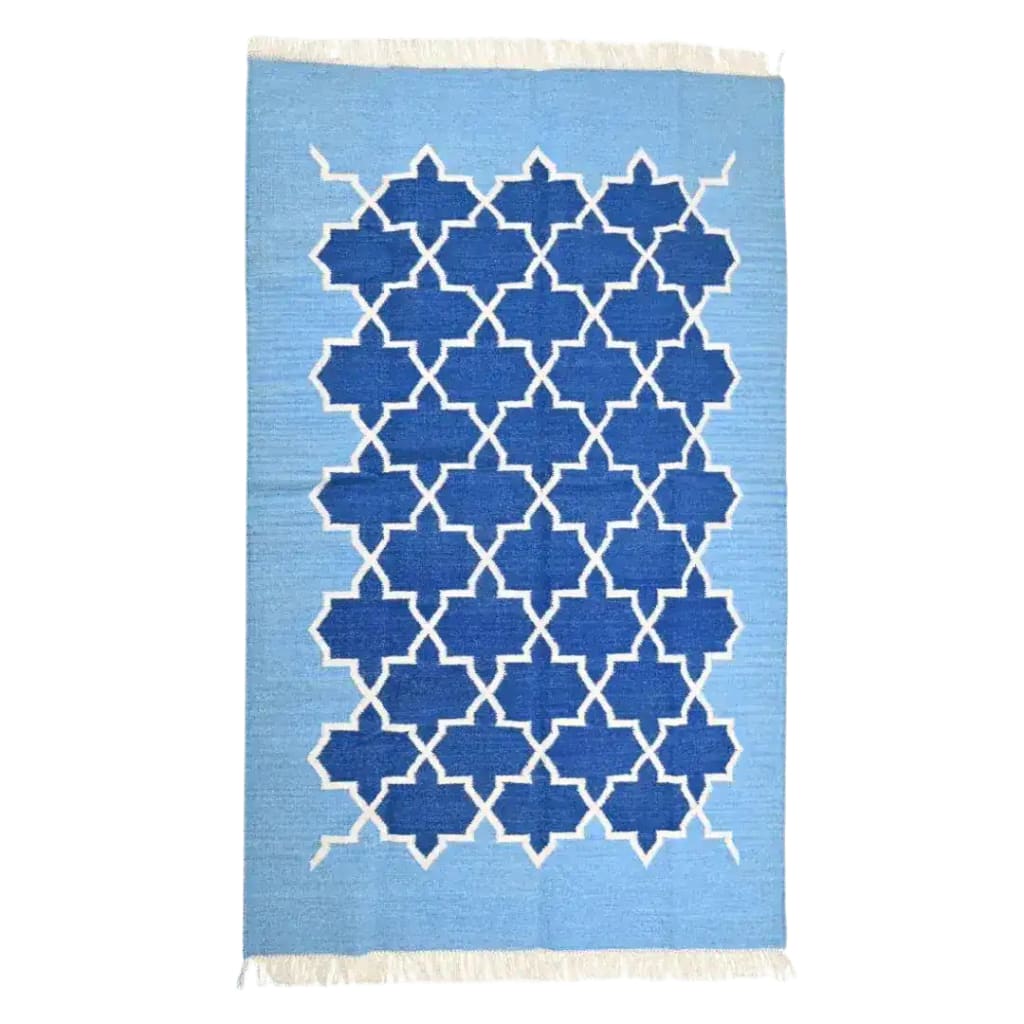 Handwoven Moroccan Blue Tiles Cotton Area Rug with fringes, perfect for a large living room. This boho rug features a striking geometric pattern in shades of blue, designed to fit 8x10 living room spaces.