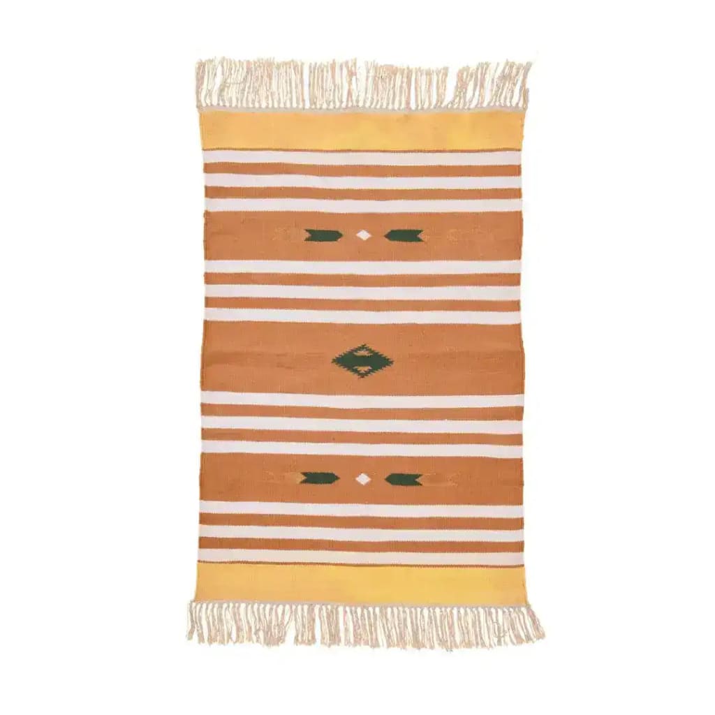 A handwoven orange and white patterned cotton area rug with fringes, perfect for adding a boho touch to your office or bedroom space. This stylish rug features intricate designs and is ideal for use as a bedroom rug or a decorative piece in a modern office.