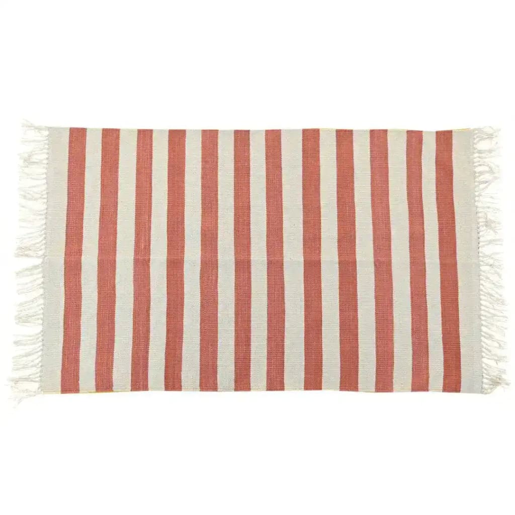 Handwoven orange and white striped cotton area rug with fringes, perfect for adding a boho touch to your dining room or living room. This vibrant and stylish rug enhances any space with its bold stripes and soft cotton texture.