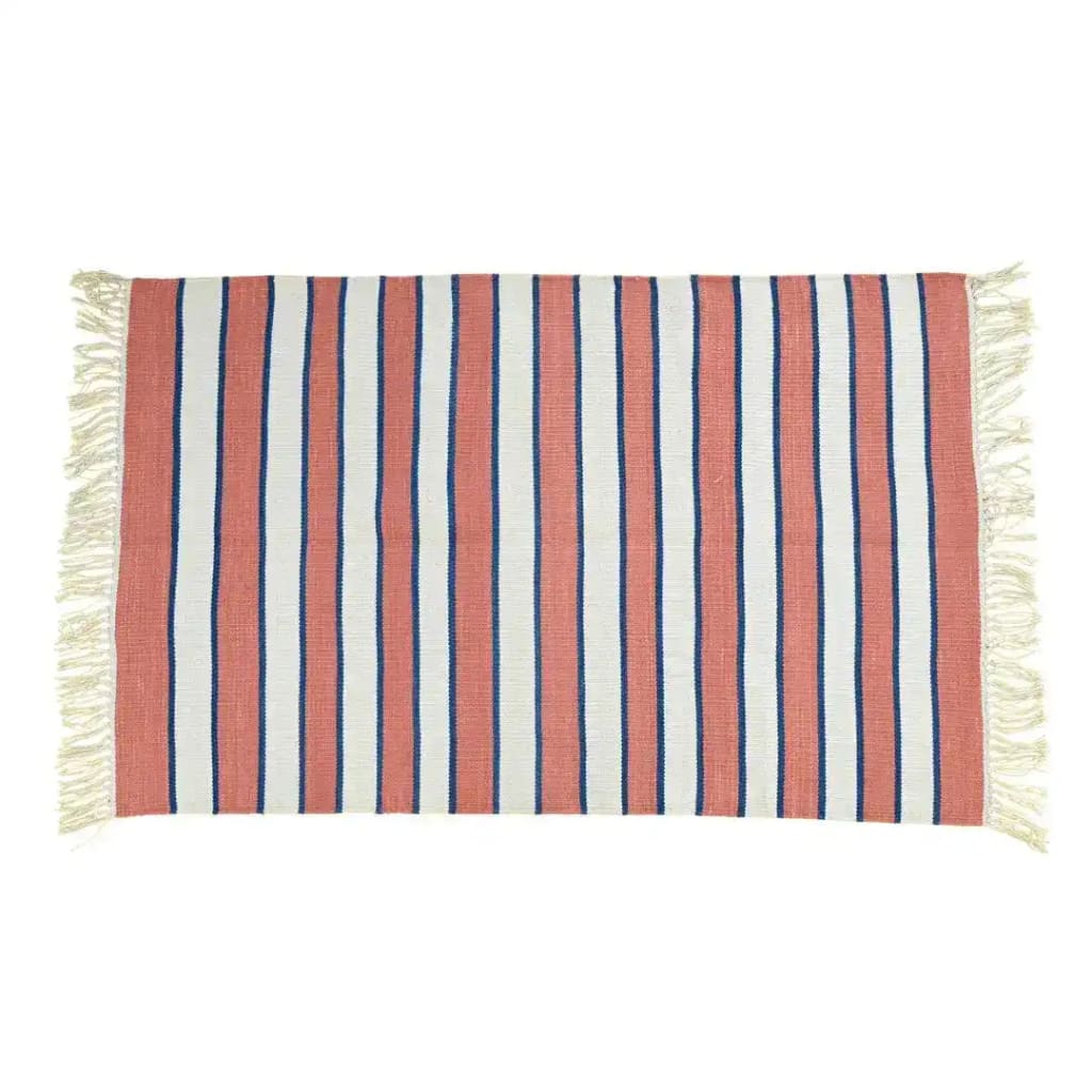 A beautiful handwoven peach and white striped cotton rug with fringes, perfect for adding a boho touch to your living room or dining room. This large area rug features soft cotton material, making it an ideal choice for dining room area rugs.