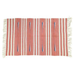 Handwoven Peach and White Tear Drop Cotton Rug with Fringes, ideal for large living room spaces. This boho rug features a striking pattern with vertical stripes and intricate details, perfect for adding a cozy touch to your living room decor.