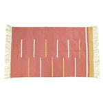 Handwoven peach and yellow minimalistic cotton rug with fringes, perfect for a boho-inspired living room. This large area rug, ideal for an 8x10 space, features a simple design with vertical stripes, adding a touch of elegance to any living area.