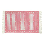 Handwoven pink and white traditional cotton area rug with fringes, perfect for adding a boho touch to your dining room decor. This dining room area rug features intricate patterns and soft textures, ideal for those seeking stylish and comfortable cotton rugs or dining room carpets.