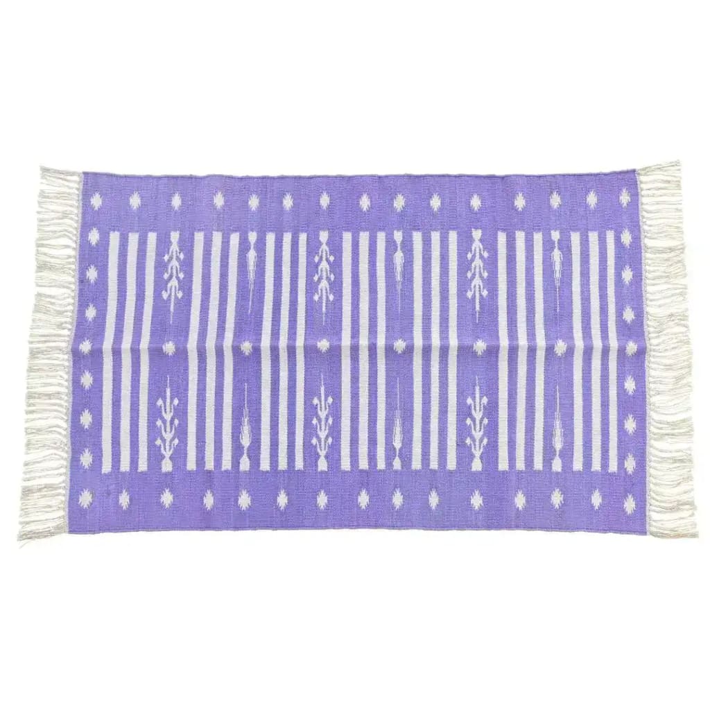 Handwoven purple and white striped cotton rug with fringes, featuring a boho design. This large area rug is perfect for adding a chic touch to your living room decor.