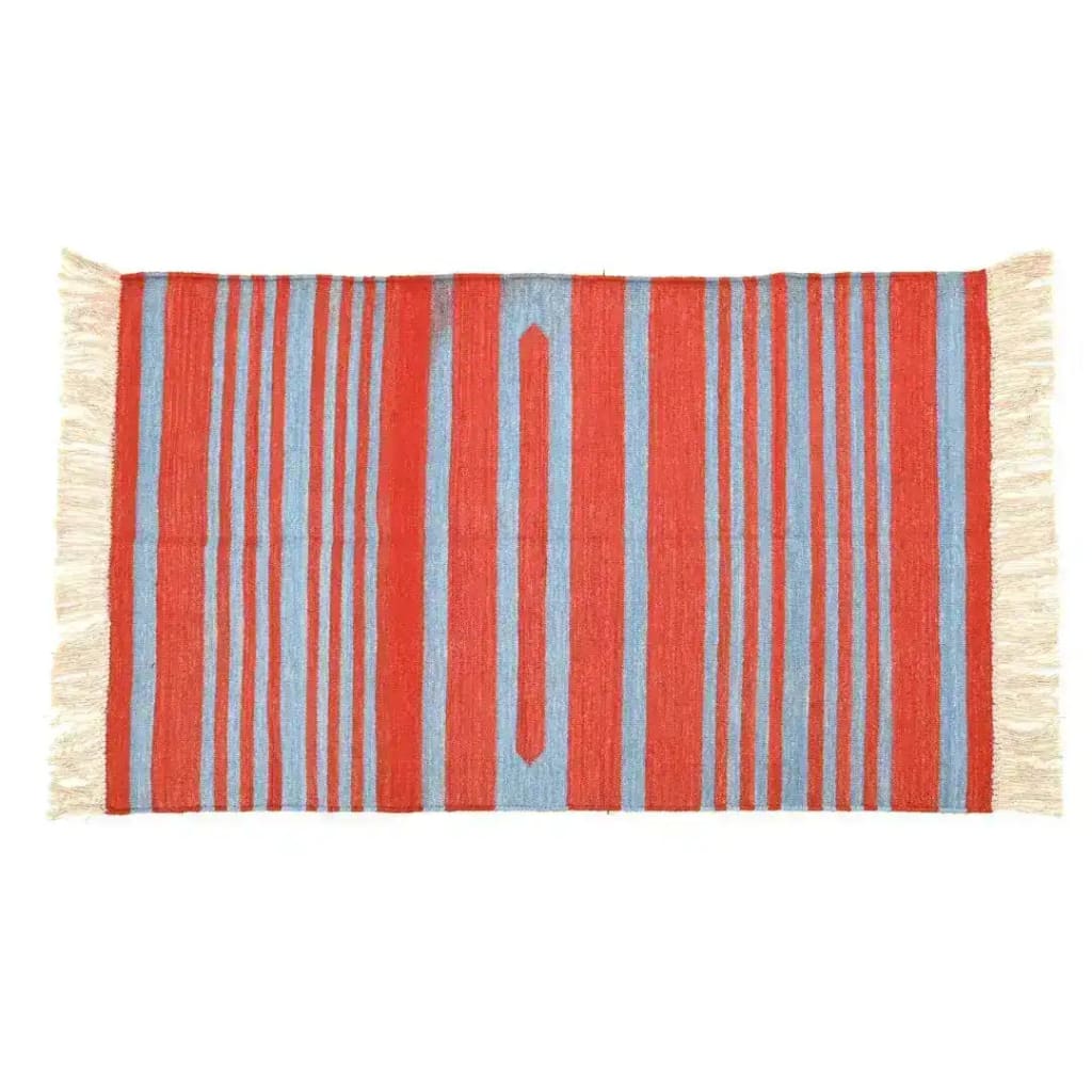 Handwoven red and blue stripe cotton area rug with fringes, perfect for adding a boho touch to your living room or office. This large living room rug features vibrant stripes and soft fabric, ideal for those seeking stylish and comfortable cotton rugs.