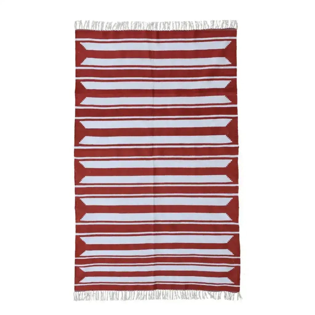 A handwoven red and white accent stripe cotton area rug with fringes, perfect for adding a boho touch to living rooms and dining rooms. This large area rug features bold horizontal stripes, making it an ideal dining table rug for a cozy, stylish atmosphere.