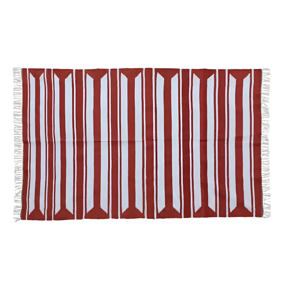 A handwoven red and white cotton area rug with accent stripes, perfect for enhancing living room and dining room spaces. This large boho rug features fringed edges, adding a stylish touch under a dining table.