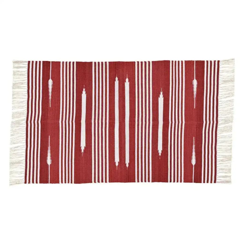 A beautifully handwoven red and white patterned cotton area rug with fringes, perfect for adding a boho touch to your dining room or bedroom. This versatile piece is ideal for dining room area rugs or bedroom area rugs, offering a cozy and stylish accent to any space.