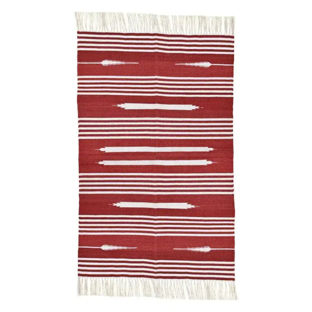 This handwoven red and white patterned cotton area rug features intricate designs and soft fringes, perfect for adding a boho touch to your dining room or bedroom. Ideal as a dining room area rug or a cozy bedroom area rug, it's crafted from high-quality cotton.