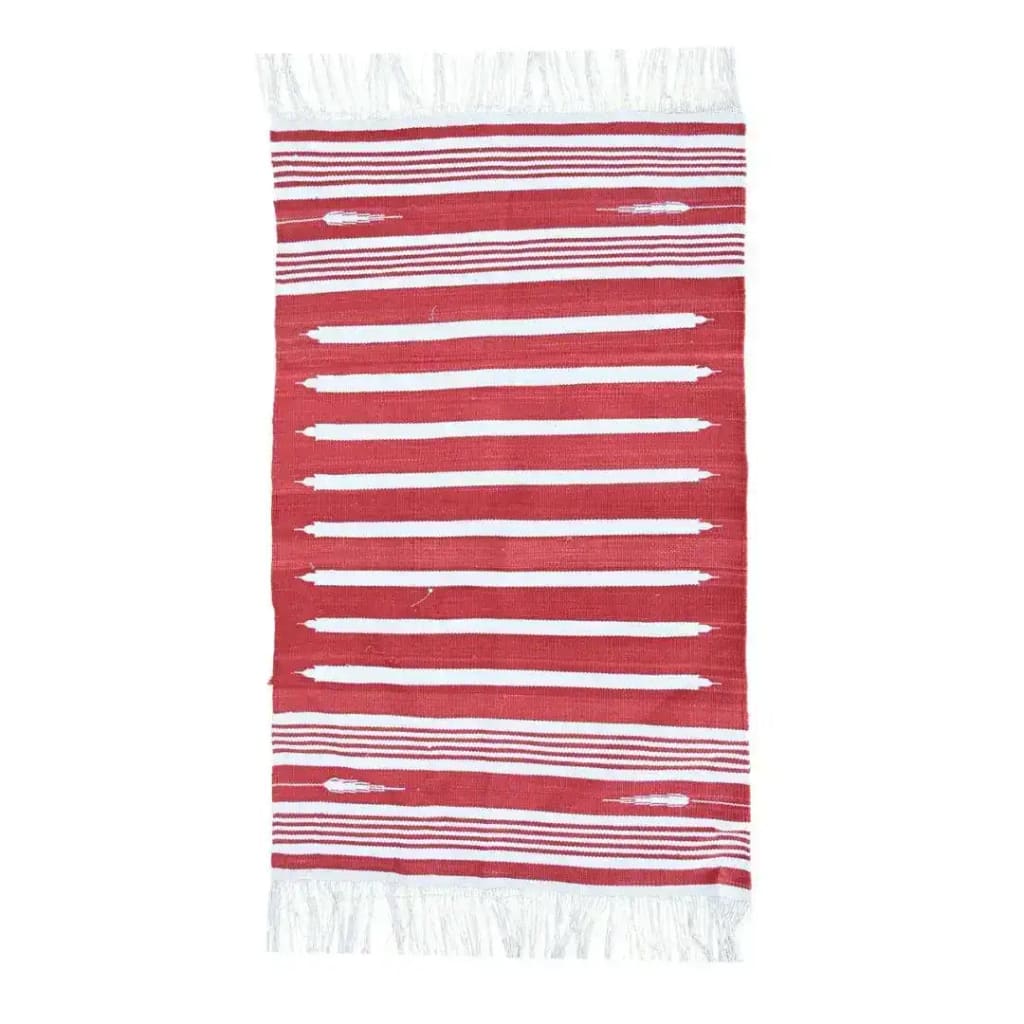This image showcases a handwoven red and white stripe minimalistic cotton area rug, perfect for adding a boho touch to your dining room or bedroom. The rug features a series of bold red and white stripes with fringes on the edges, making it an ideal choice for formal dining room settings or as a cozy addition to your bedroom decor.