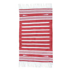 This image showcases a handwoven red and white stripe minimalistic cotton area rug, perfect for adding a boho touch to your dining room or bedroom. The rug features a series of bold red and white stripes with fringes on the edges, making it an ideal choice for formal dining room settings or as a cozy addition to your bedroom decor.