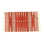 A beautifully handwoven red and white stripe patterned cotton rug with fringes, perfect for adding a boho touch to your living room. This large area rug is ideal for creating a cozy and stylish atmosphere in any space.