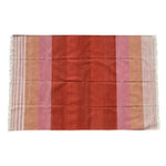 Handwoven red ombre cotton rug with fringes, perfect for adding a boho touch to your dining room or living room. The vibrant hues and soft texture make it an ideal area rug for living spaces, blending style and comfort effortlessly.