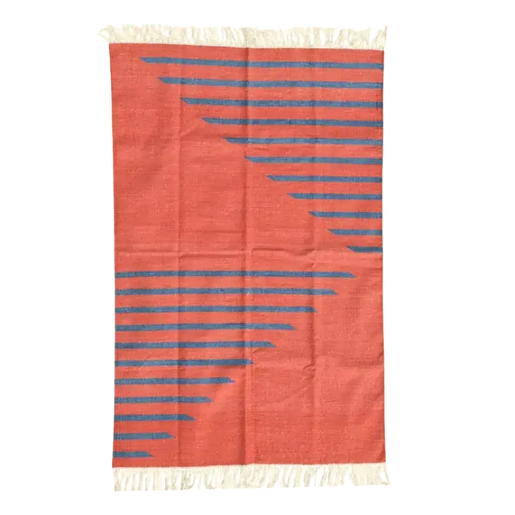 Handwoven tangerine and blue stripe cotton area rug with fringes, ideal for a boho living room. Perfect as a stylish addition to area rugs for living rooms, this cotton rug showcases a vibrant pattern that enhances any space.