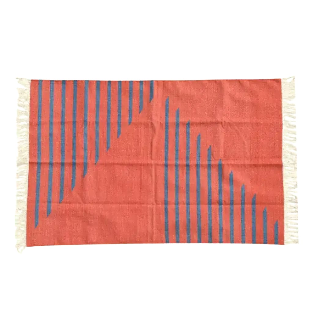 Bright and stylish, this Handwoven Tangerine Blue Stripe Cotton Rug is perfect for adding a boho touch to your living room. The area rug features a vibrant tangerine base with bold blue diagonal stripes, complemented by fringed edges, making it an ideal choice for those seeking unique rugs for living room settings.