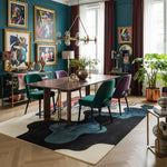 colorful modern dining room with geometric abstract rug.