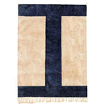 Top view of the Harry and Henry Moroccan Handwoven Wool Area Rug featuring a bold geometric design with deep navy and cream colors. This contemporary runner rug adds a modern touch to any space, perfect for kitchens, hallways, or bathrooms. Made from high-quality wool, it offers durability and style as a kitchen runner rug or hallway runner rug.