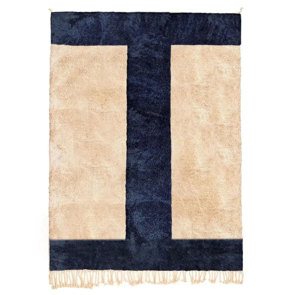 Top view of the Harry and Henry Moroccan Handwoven Wool Area Rug featuring a bold geometric design with deep navy and cream colors. This contemporary runner rug adds a modern touch to any space, perfect for kitchens, hallways, or bathrooms. Made from high-quality wool, it offers durability and style as a kitchen runner rug or hallway runner rug.