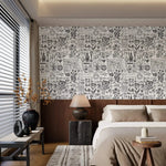 Herbal alchemy wallpaper with fine botanical sketches above wood paneling in a serene neutral bedroom