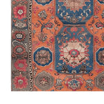 Close-up view of the Heritage Bloom Hand Knotted Area Rug showcasing its vibrant vintage design. The intricate Persian patterns with bold colors make it a perfect large living room rug, adding elegance and charm.