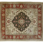 This Heritage Floral Elegance Hand Knotted Area Rug features an intricate floral pattern with vintage Persian influences, perfect for enhancing living room spaces. The rich, earthy tones and detailed design make it an ideal choice for those seeking elegant area rugs for living room decor.