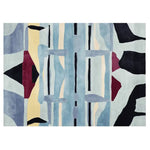 A beautiful area rug with an abstract design featuring a blend of blue, black, red, and yellow patterns. This contemporary wool rug is perfect as a living room centerpiece, measuring 8x10, and adds a modern touch to any space.