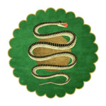 High-detail top view of the scalloped green rug, striped snake winding over a tan apple