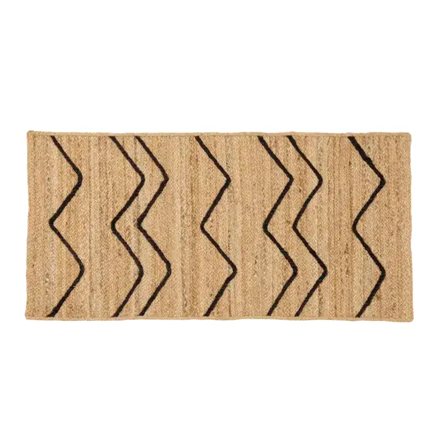 Top view of a Hilly Natural Jute Rug featuring a simple, elegant zigzag pattern. Perfect for enhancing your area rug collection, this versatile piece is ideal for kitchen rugs, hallway runner rugs, or as a boho accent in a bedroom. Its natural texture and design make it suitable for any dining room or formal dining room setting.