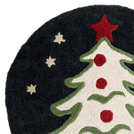 Close-up view of the Holiday Bliss Round Hand Tufted Area Rug, featuring a festive Christmas tree design with red stars and ornaments, perfect for adding warmth to your dining room. This wool round rug is an ideal large area rug choice for dining room settings.