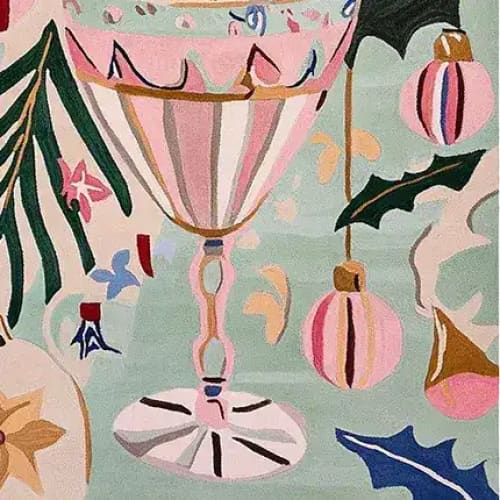 This vibrant area rug features a festive holiday scene with a large, elegant pink and gold goblet at the center, surrounded by colorful ornaments and lush green foliage. Perfect for adding warmth to your living room area, this wool rug combines artistry with functionality, making it an ideal choice for those seeking large living room rugs that bring a seasonal touch.