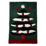The "Holly Jolly Tree Hand Tufted Rug" brings festive cheer to your home with its vibrant colors and charming holiday tree design.