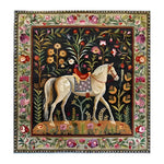 Horse & Blossom hand knotted rug, white horse with red saddle amid colorful botanicals on black ground, floral border