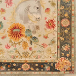 A beautifully detailed hand-knotted area rug featuring a stunning horse and floral design, perfect for adding elegance to living room spaces. This Persian-style rug in an 8x10 size showcases intricate patterns with vibrant colors, ideal for those seeking a unique floral rug among living room area rugs.
