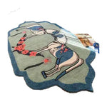 A unique hand-tufted area rug featuring an abstract design with horses, perfect for adding a boho touch to your dining room or living room. This large wool rug combines vibrant colors and intricate patterns, making it an ideal choice for those seeking large area rugs for a stylish living space.