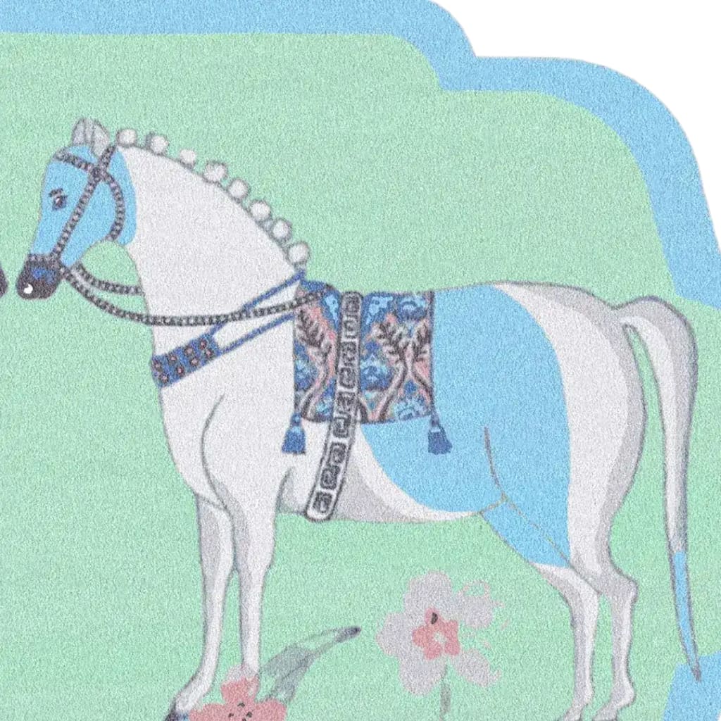 A beautifully designed hand-tufted wool rug featuring an artistic depiction of a horse with a blue and white color scheme. This large area rug is perfect for adding a boho touch to your dining room or living room, blending style and comfort seamlessly.