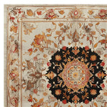 This luxurious area rug showcases a vibrant floral design with intricate patterns, ideal for enhancing both the living room and bedroom. The hand-tufted wool square rug features a central medallion with rich colors that stand out against a contrasting black background, perfect as a stylish addition to your home decor.