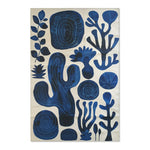 Indigo Desert Dreams Abstract Botanical Rug indigo blue abstract plants spirals cactus on ivory cream background flat shot
