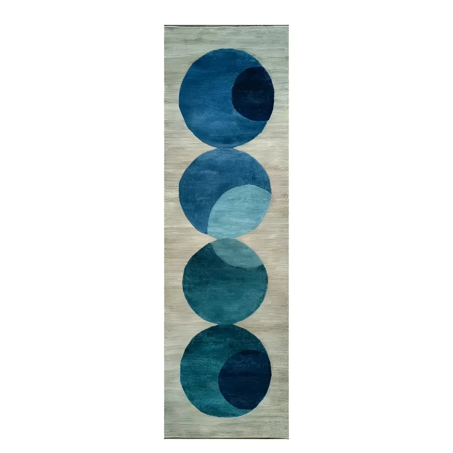The Indigo Orbit Hand Tufted Wool Rug Runner features a contemporary design with overlapping blue circles against a neutral background. This area rug is perfect for adding a modern touch to your living room, hallway, or kitchen. Made from high-quality wool, it serves as an elegant hallway runner rug, suitable for both large living rooms and cozy spaces.
