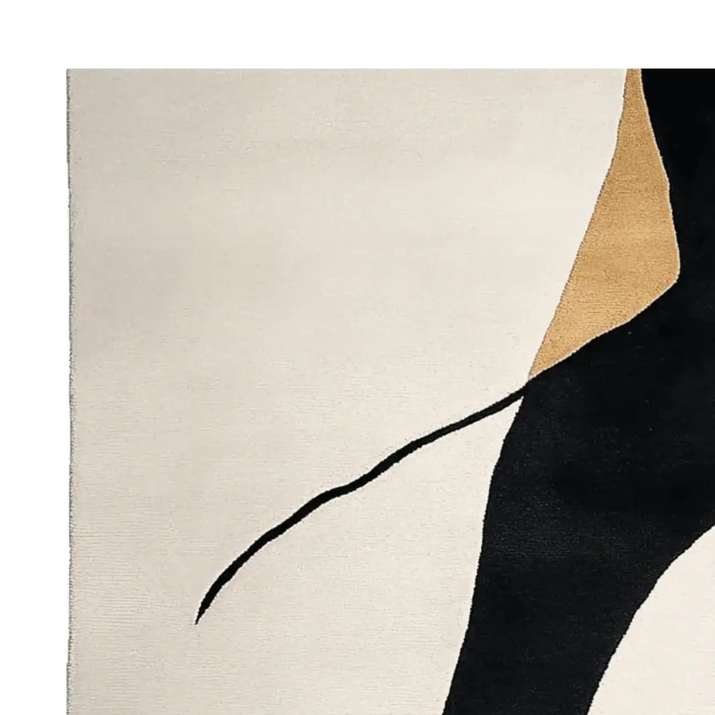 A close-up view of the Ink Flow Hand Tufted Rug, showcasing its contemporary abstract design with black, tan, and off-white colors. This wool area rug is perfect for modern living room spaces, available in an 8x10 size.