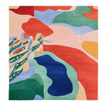 A vibrant and colorful area rug featuring abstract shapes in shades of red, green, blue, and yellow. This contemporary wool rug is a perfect addition to a large living room, providing both style and comfort. Ideal as a square area rug, it measures 8x10 and adds a modern touch to any space.