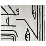 Top view of the Inkbound Face Geometry Hand Tufted Rug showcasing its modern design. This contemporary area rug features bold black lines and abstract shapes on a soft wool surface, perfect for large living rooms. Ideal as a statement piece for a cozy 8x10 space.