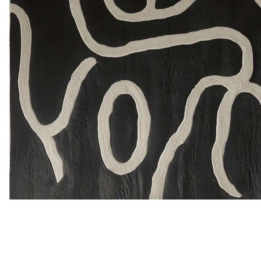 Close-up view of the Inkstream Hand Tufted Wool Rug showcasing an abstract pattern in black and white. Perfect for adding a contemporary touch to living room area rugs, this wool rug brings modern elegance to any space. Ideal for living room rugs 8x10, the design highlights intricate tufting details.