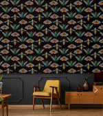 Insect Harmony Wallpaper above dark wainscoting in eclectic living room with yellow armchair; green beetles on black