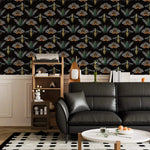 Insect Harmony Wallpaper above white wainscoting behind black sofa; beetles and moths repeating pattern on black