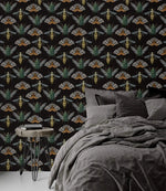 Insect Harmony Wallpaper as bedroom feature wall with gray linen bed; green beetles and moths on dark background